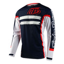 The Troy Lee Designs SE PRO JERSEY MARKER NAVY / RED features long sleeves, navy, white, and red colors, bold logos on the front and sleeve, white chest stripes, and red side accents—ideal racewear for elite motocross athletes.