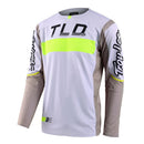 The Troy Lee Designs SE PRO JERSEY GRID FOG / FLO YELLOW is a lightweight long-sleeve race jersey in white, grey, and neon yellow with "TLD" chest and "Troy Lee" sleeve logos. Features mesh panels and a modern, athletic fit.