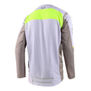 The Troy Lee Designs SE PRO JERSEY GRID FOG / FLO YELLOW is a lightweight long-sleeve race jersey in white, grey, and neon yellow with "TLD" chest and "Troy Lee" sleeve logos. Features mesh panels and a modern, athletic fit.
