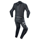 The Missile v2 Ward 1Pc Suit by Crown Kiwi Enterprises Limited is a black MotoGP-inspired leather suit with white logos, featuring protective padding on the shoulders, elbows, and knees, displayed against a plain white background. This race suit is designed for high-performance riding safety.