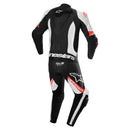 The Missile v2 Ward 1Pc Suit by Crown Kiwi Enterprises Limited is a black, white, and red leather motorcycle suit designed for racing, equipped with protective padding and Tech-Air readiness. It features branding on the chest, arms, and legs, and provides exceptional abrasion resistance for enhanced safety on the track.