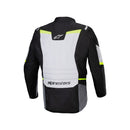 The Alpinestars ST-1 Waterproof Jacket by Crown Kiwi Enterprises Limited showcases a stylish blend of black, white, and gray with neon yellow accents. It features a zip-up front and adjustable side straps for ergonomic mobility, along with branding on the chest and sleeves. Its multiple panels ensure both style and protection.