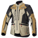 The Alpinestars Bogotá Pro Drystar Jacket, in tan, black, and beige with orange accents, offers a high collar and multiple zippered pockets. This all-season ALPINESTARS jacket ensures waterproof protection and durability with its reinforced materials.
