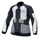 The Alpinestars Andes Air Drystar Jacket by ALPINESTARS comes in black, white, and gray with yellow accents. It features multiple pockets, zippers, adjustable straps, a chest logo, and durable material with a removable waterproof Drystar membrane for dual-season protection while touring.