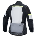 The Alpinestars Andes Air Drystar Jacket by ALPINESTARS comes in black, white, and gray with yellow accents. It features multiple pockets, zippers, adjustable straps, a chest logo, and durable material with a removable waterproof Drystar membrane for dual-season protection while touring.