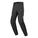 The Alpinestars ST-1 Waterproof Pants by Crown Kiwi Enterprises Limited are designed for adventure touring in a sleek black style. They feature zippers on the thighs, reinforced knee areas for ergonomic mobility, and a subtle logo on the upper leg, prioritizing comfort and protection.