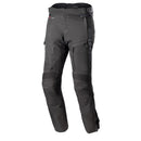 The Alpinestars Bogota Pro Drystar Pants feature an adjustable waist, knee pads, zippered pockets, and reinforced stitching for protection and comfort. These black adventure riding pants by ALPINESTARS are displayed on a white background and include a waterproof liner for versatility.