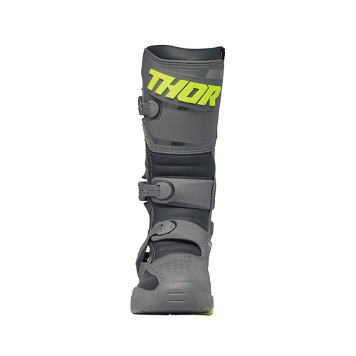 The THOR MX Blitz XR Boots GY/CH feature a gray and black motocross design with neon yellow accents and prominently display the "THOR" brand name on the side. These boots are crafted from synthetic materials, incorporating adjustable straps, reinforced panels, and injection molded components to enhance durability and protection.