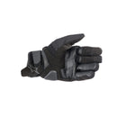 The ALPINESTARS SMX-1 Drystar Gloves are black motorcycling gloves with reinforced knuckles, showcasing a sleek design from the side to highlight their ergonomic fit and impact protection.
