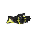 A black and yellow ALPINESTARS Sp 3 Glove with hard knuckle protection and Velcro wrist closure is displayed palm-down on a white background.