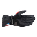 The Alpinestars Honda SP-8 v3 Gloves, offered by Crown Kiwi Enterprises Limited, are black riding gloves adorned with red and blue details. Made from durable leather and featuring MotoGP-inspired knuckle armor, these gloves prominently display Honda branding alongside an additional logo on the wrist, seamlessly combining safety with style.
