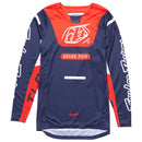 The Troy Lee Designs YOUTH GP PRO JERSEY BLENDS NAVY / ORANGE is a bold, race-fit jersey featuring vibrant navy and orange, with "TLD" logos and contrasting panels for style and comfort on every ride.