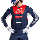 The Troy Lee Designs YOUTH GP PRO JERSEY BLENDS NAVY / ORANGE is a bold, race-fit jersey featuring vibrant navy and orange, with "TLD" logos and contrasting panels for style and comfort on every ride.