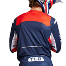 The Troy Lee Designs YOUTH GP PRO JERSEY BLENDS NAVY / ORANGE is a bold, race-fit jersey featuring vibrant navy and orange, with "TLD" logos and contrasting panels for style and comfort on every ride.