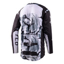 The Troy Lee Designs GP PRO JERSEY BLENDS CAMO BLACK / WHITE is a black long-sleeve motocross top with white branding, "Troy Lee Designs" on the sleeves, "GRAND PRIX" on the front, and ventilated mesh panels for breathability.