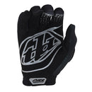 The Troy Lee Designs AIR GLOVE BLACK | YOUTH features a textured, full-fingered design in black with a bold white logo—ideal mountain bike gloves for grip and style, shown on a white background.