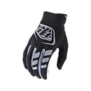 The Troy Lee Designs REVOX GLOVE BLACK features perforated fingers, white accents, and a bold logo on the back, presented against a plain white background.