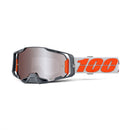The Armega Goggle Silver by 100% features a black frame and HiPER tinted lenses for enhanced contrast. A white adjustable strap displays bold red "100%" branding. Designed with ventilation and a modern angular look, these goggles guarantee clarity and style on every ride.
