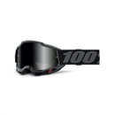 Accuri 2 Sand Goggles by 100% feature a sleek black design with a gray smoke lens, and the strap prominently showcases the "100%" logo, ideal for skiing or motocross.