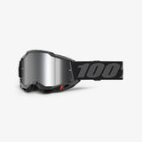 The Accuri 2 Youth Goggle Black by 100% features a reflective lens, adjustable strap with "100" in bold, and vented frames. Designed specifically for young motocross riders, these high-performance goggles boast a modern, angular look.