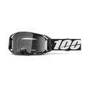 The ARmatic Goggle Black by 100% are black and gray motocross goggles with a thick black strap featuring bold white "100" numbers, offering a sleek design and quick-release clear lenses ideal for protection in intense sports.