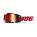 The ARmatic Goggle Mach Z by 100% features an angular design, tinted orange-red lenses, a blue frame with a quick-release lens system, and an adjustable white strap with bold red "100" lettering—ideal for motocross enthusiasts seeking style and functionality.