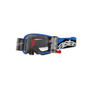 The ALPINESTARS Supertech Stream Goggle features a blue rim, clear Absolute Vision lenses, and a black and blue logo strap. Its frame includes an attached roll-off system for clear vision in muddy conditions and enhanced peripheral vision.