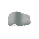 The RC2/AC2/ST2 Smoke Lens by Crown Kiwi Enterprises Limited is a reflective, rectangular lens with curved edges and multiple notches, designed for 100% Goggles, featuring an anti-fog coating on a white background.