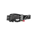 Crown Kiwi Enterprises Limited's Vision 8 Corp Goggle: Black and white motocross goggles with clear anti-fog polycarbonate lens, roll-off film system, enhanced peripheral vision, white logo strap, and red pull tab on the film canister.