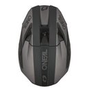 The O'Neal 2026 3SRS SOLID Helmet in black/grey by ONEAL offers full-face coverage, a visor, chin guard, and vent openings. Its angular ABS shell design features the ONEAL logo on the side and visor.