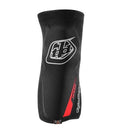 The Troy Lee Designs SPEED KNEE SLEEVE BLACK | YOUTH is a black and red D3O knee pad with a white logo, seamless construction for a sleek look, and a visible D3O label near the bottom.
