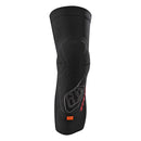 The Troy Lee Designs STAGE KNEE GUARD BLACK features a sleek, ergonomic design with subtle geometric patterns and a front logo. Flexible and protective, it's ideal for sports or outdoor activities.