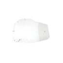 The AC2/ST2 Youth Lens Clear by 100% is a clear, slightly curved face shield with UVA and UVB protection, featuring small edge notches for attachments, isolated on a white background.