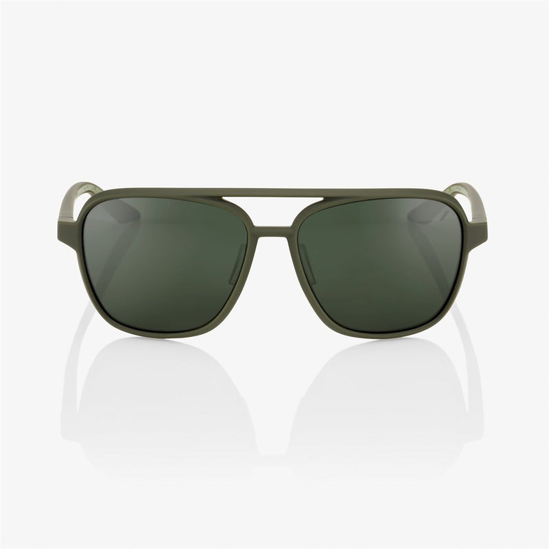 The Kasia Soft Tact Army Green sunglasses by Crown Kiwi Enterprises Limited feature dark lenses and sleek square frames with metallic temple accents. They offer UV protection and ultra-lightweight comfort, photographed on a white background.