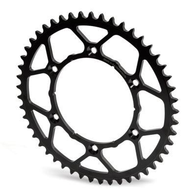 A MOTO MASTER SPROCKET REAR ULTRALIGHT STEEL 50T for Honda XR and Yamaha TTR, WR, YZ comes in black with a large, circular shape and teeth around the outer edge. The inner section showcases a geometric, open design with several cutouts to reduce weight. Made from hardened steel for extra durability, it features multiple bolt holes for attaching to a crankarm.