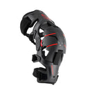 The Alpinestars RK-1 Plasma Knee Brace by City Honda Manawatu, with its black and red design, adjustable straps, and padding, is perfect for off-road riding. Its ergonomic design includes a sturdy outer shell that provides impact protection and solid support for the knee joint.