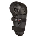 The Alpinestars Kickstart Knee Guard by Crown Kiwi Enterprises Limited is a sleek and durable black knee protector designed with an articulated construction. It features a hard shell with a padded interior, and includes two adjustable straps along with a logo on the front, making it ideal for sports or activities that demand dependable knee protection.