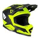The UFO Echus Helmet in neon yellow and black features angular geometric designs, an alien logo near the back, and "UFO" branding. ECE 22.06 certified, it ensures top-notch safety for off-road adventures with its visor-equipped design.