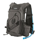 A close-up of the ONEAL O'NEAL Romer Hydration Backpack reveals a hydration bladder partially visible through an open zipper compartment. The blue hydration pack with a black cap is ideal for outdoor activities, boasting padded straps, mesh pockets, and adjustable chest and waist straps.