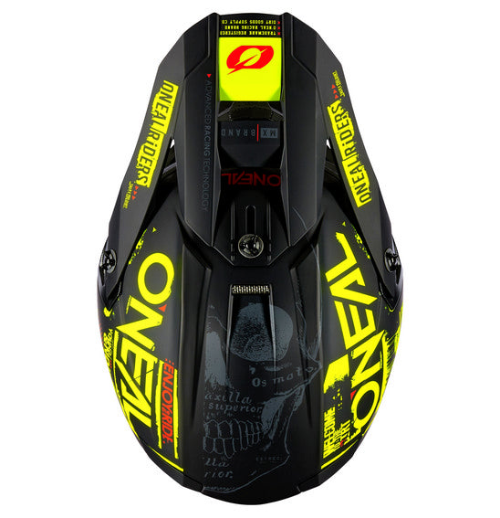 A top view of the O'Neal 5SRS ATTACK Helmet - Black/Neon showcases its striking graphic designs in neon yellow and white. The ABS shell construction ensures durability, with the ONEAL logo prominently displayed on the sides and top. Various branding and text, including a bold skull graphic, are imprinted around its surface.