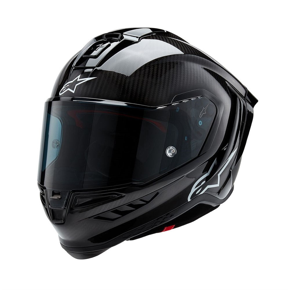 Presenting the Supertech R10 Helmet Solid Black Carbon Matte/Gloss by Crown Kiwi Enterprises Limited: a stylish road racing helmet that combines a glossy finish and advanced aerodynamics. It boasts a smoked visor, ventilation slits, and subtle graphic accents, making it perfect for high-speed riding. This helmet ensures top performance and style on every journey.