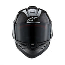Presenting the Supertech R10 Helmet Solid Black Carbon Matte/Gloss by Crown Kiwi Enterprises Limited: a stylish road racing helmet that combines a glossy finish and advanced aerodynamics. It boasts a smoked visor, ventilation slits, and subtle graphic accents, making it perfect for high-speed riding. This helmet ensures top performance and style on every journey.