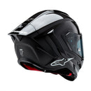 Presenting the Supertech R10 Helmet Solid Black Carbon Matte/Gloss by Crown Kiwi Enterprises Limited: a stylish road racing helmet that combines a glossy finish and advanced aerodynamics. It boasts a smoked visor, ventilation slits, and subtle graphic accents, making it perfect for high-speed riding. This helmet ensures top performance and style on every journey.