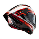 The ALPINESTARS Supertech R10 Helmet in Team Black Carbon/Red/White Gloss offers a sleek design for road racing, with advanced aerodynamics, a clear visor, and eye-catching branding on the sides and chin.