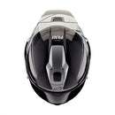 The ALPINESTARS Supertech R10 Helmet Element flaunts a sleek carbon and silver design with advanced aerodynamics. It features a glossy finish, angular patterns, a large tinted visor, and showcases a prominent logo on the front with subtle side text.