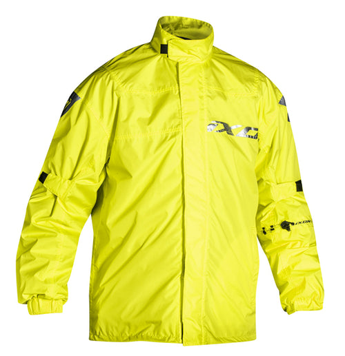 An Ixon MADDEN Jacket in bright yellow and black is shown from the back, featuring a high collar and long sleeves. Reflective prints are visible on the shoulders, with a larger IXON logo displayed on the upper back. The material appears to be lightweight, waterproof, and breathable.