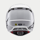 The ALPINESTARS Supertech S-M10 Solid White is a sleek, aerodynamic full-face motocross helmet with ventilation openings and angular contours. A black logo on the side enhances its modern style against a light gray background.