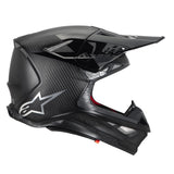The ALPINESTARS Supertech S-M10 Helmet Black Carbon Matte/Gloss features an aerodynamic profile, sleek design, prominent visor, and glossy finish. A distinctive logo and visible ventilation ensure optimal airflow, reflecting the high standards of Alpinestars' performance-enhancing helmets.