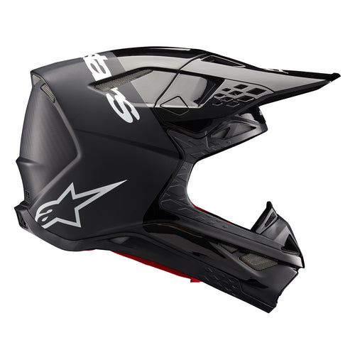The Supertech S-M10 Helmet Flood Black/Dark Gray by Crown Kiwi Enterprises Limited features a sleek design with a glossy black finish and dark gray accents. Its aerodynamic profile is characterized by angular lines, a protective visor, and strategically placed vents for optimal ventilation.
