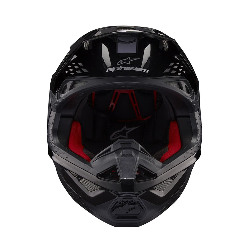 The Supertech S-M10 Helmet Flood Black/Dark Gray by Crown Kiwi Enterprises Limited features a sleek design with a glossy black finish and dark gray accents. Its aerodynamic profile is characterized by angular lines, a protective visor, and strategically placed vents for optimal ventilation.